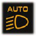 Automatic illumination of headlamps on indicator warning lamp icon